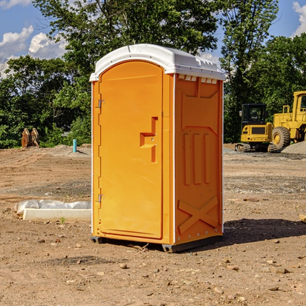 how often are the portable restrooms cleaned and serviced during a rental period in Clark OH